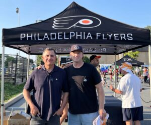 Grey Matter Direct President Ned Barrett and Todd Fedoruk at the Havertown Police Flyers Event.